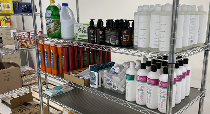 Shelves of supplies for high school students.