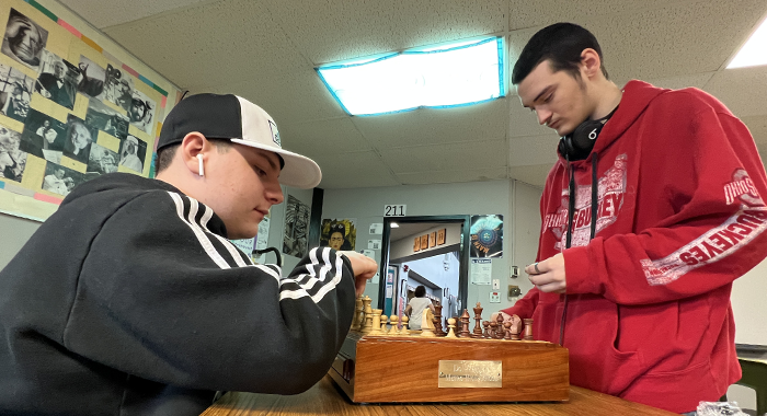 Metro students are getting ready to play chess.