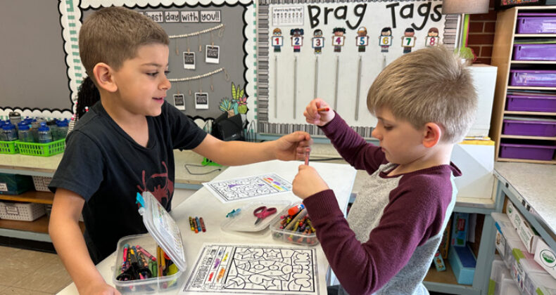 Students using crayons