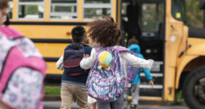 Children loading on bus