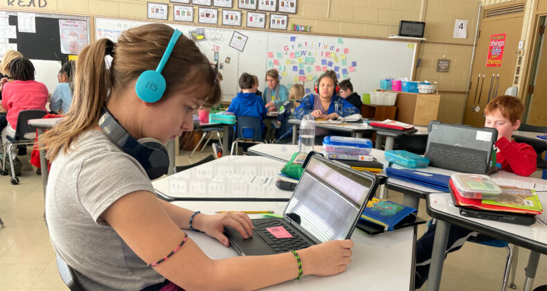 Students working on Computer